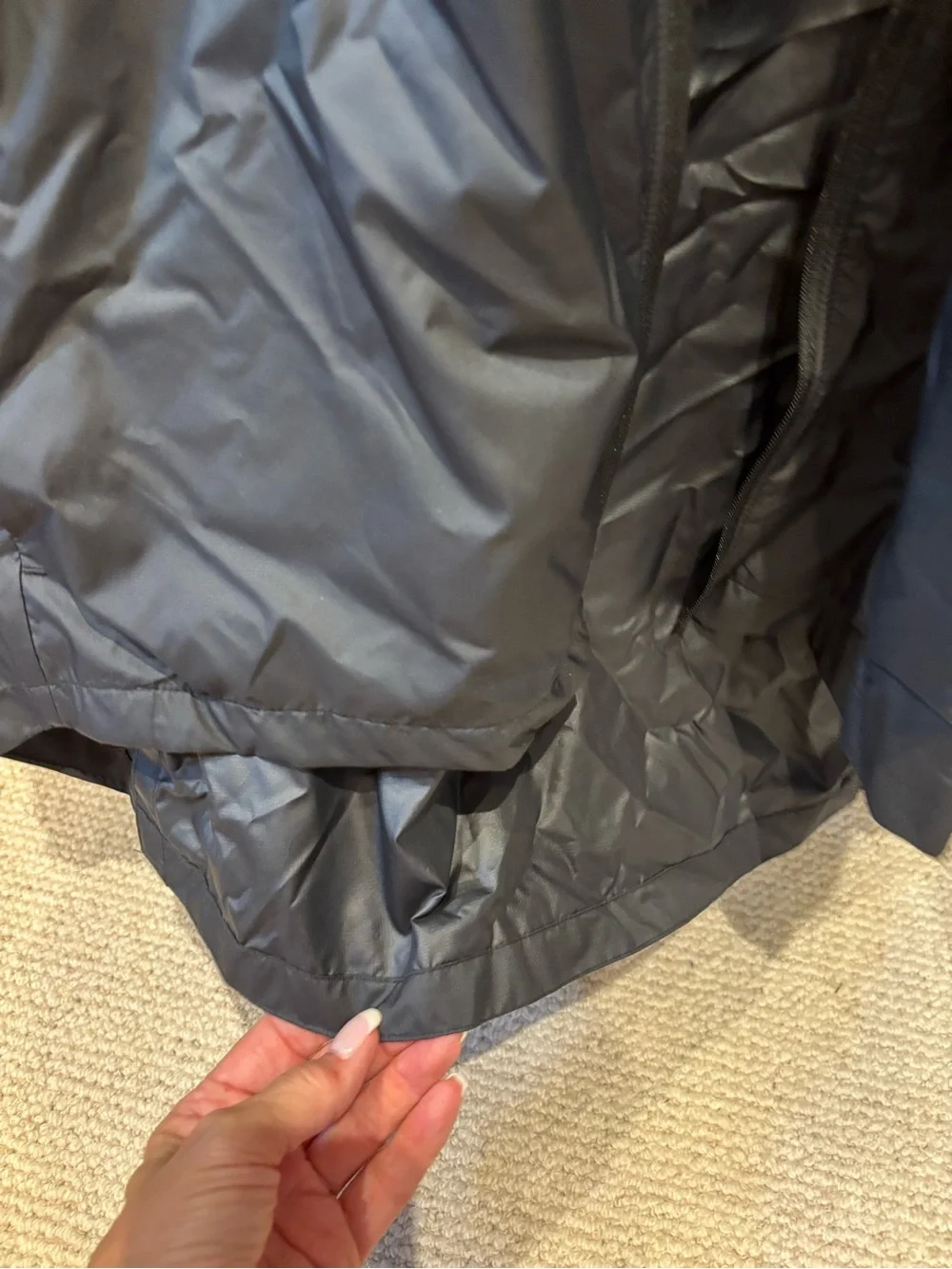 Nike Black Hooded Rain Jacket with Reflective Swoosh. Longer in back, hood.
